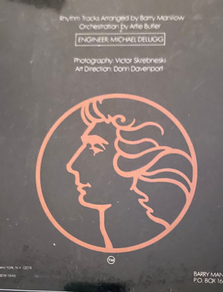 A silhouette of Barry Manilow on the back cover of his 1979 album, One Voice. 
