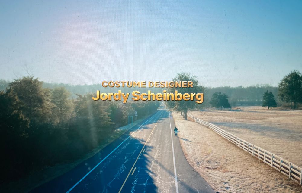 A screenshot from the film, Happy Gilmore 2, that reads, “Costume Designer Jordy Scheinberg”