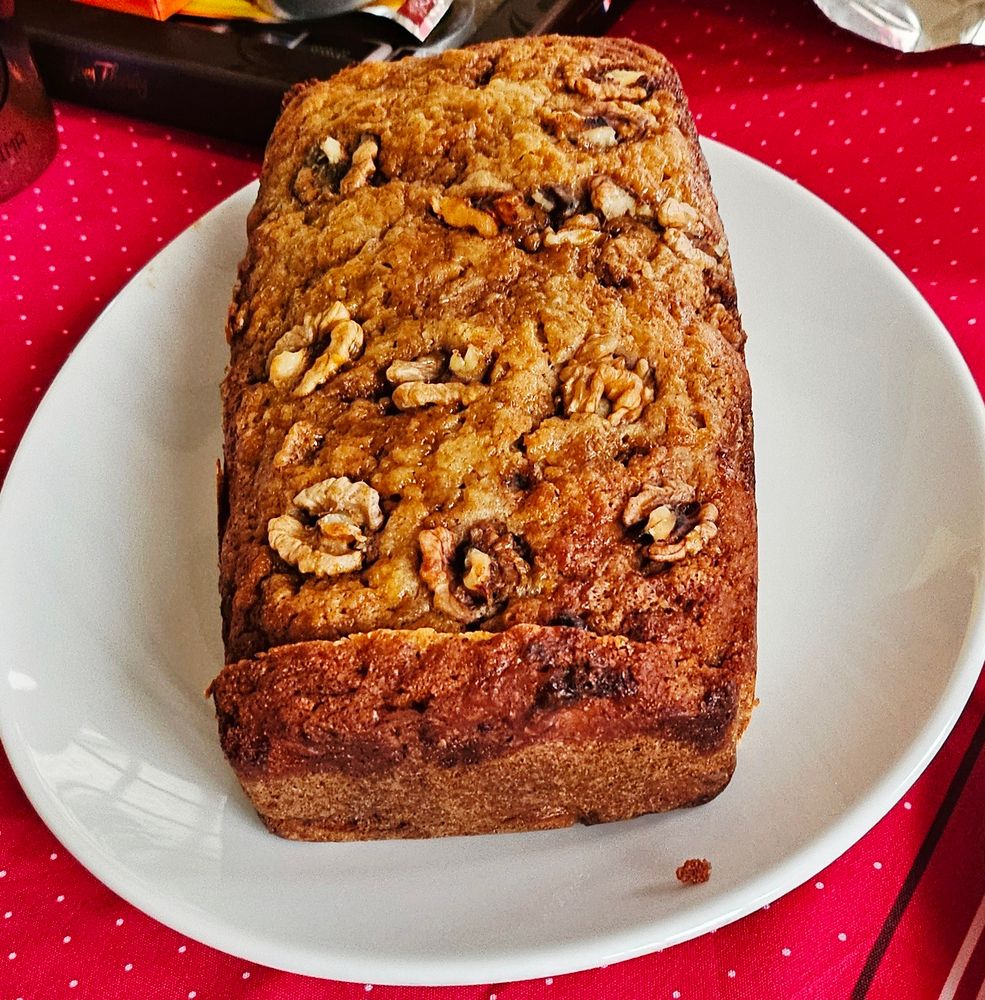A banana bread with pecan nuts 