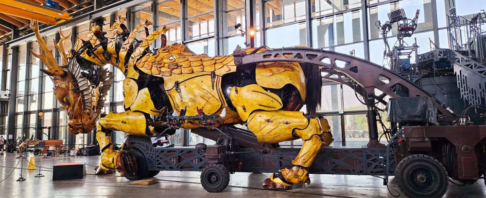 The whole dragon animatronic body attached to a machine part 