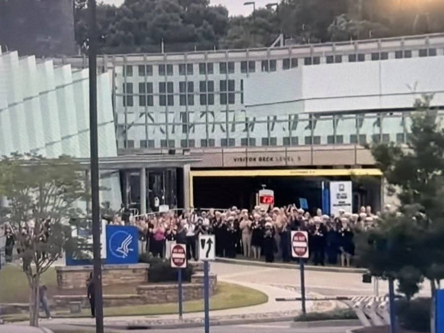 Image of mass walkout of staff at CDC in Atlanta