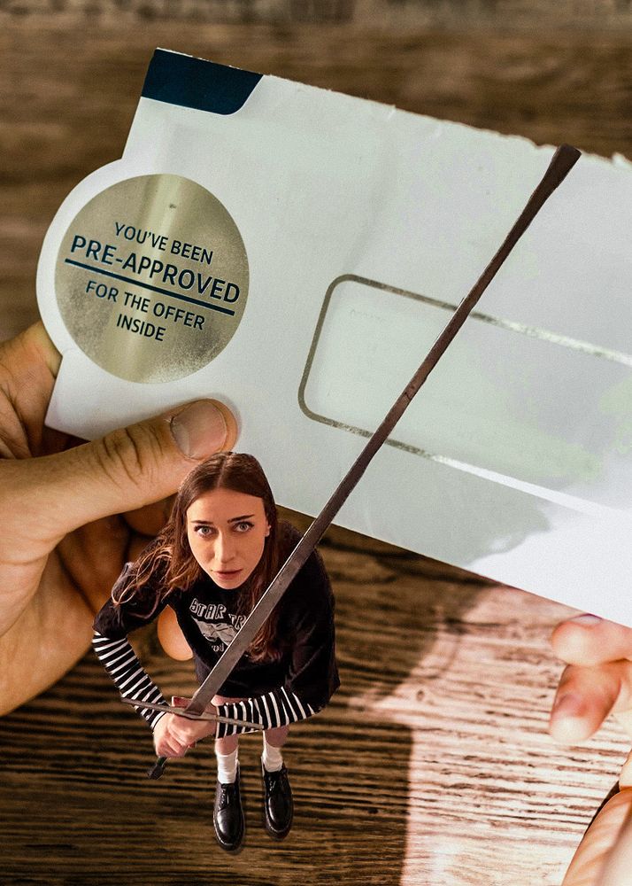 Angelica Trae is wielding a giant claymore, but she is just a letter opener 