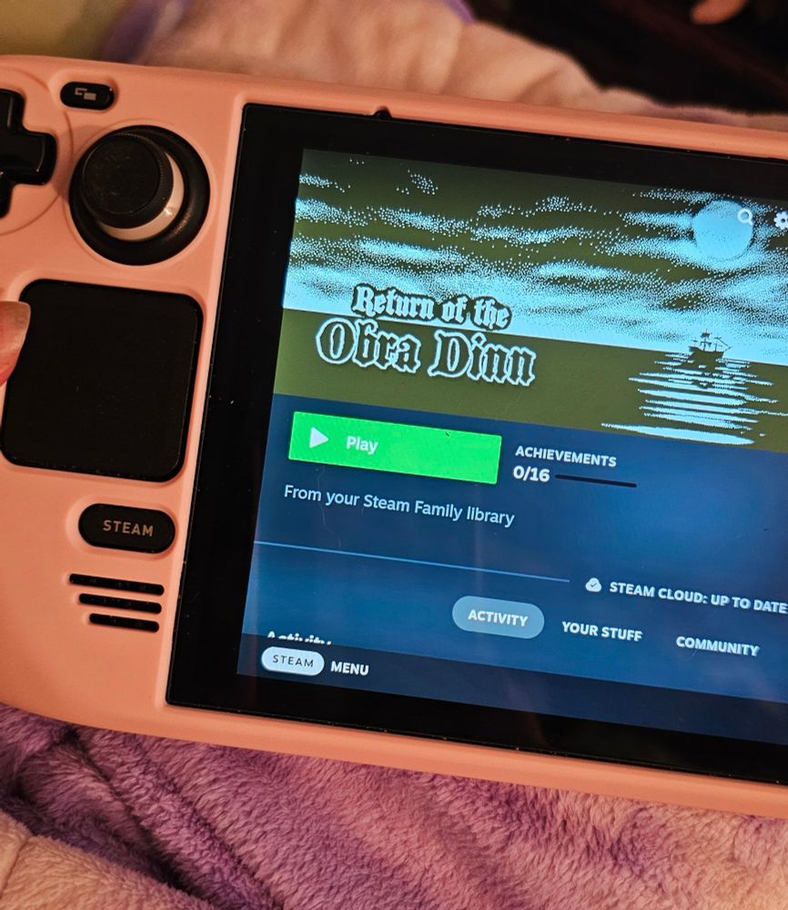A Steamdeck console playing  Return of the Obra Dinn 
