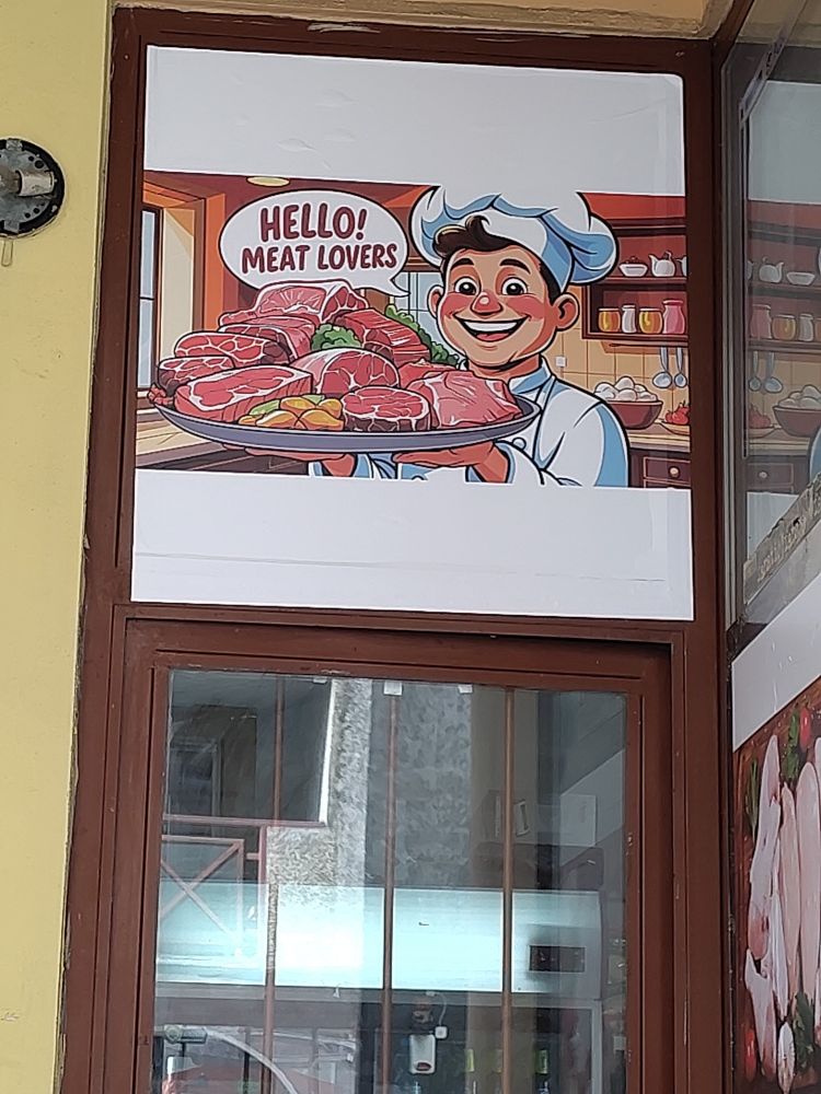 Image of a guy serving tons of meat saying hello meat lovers!