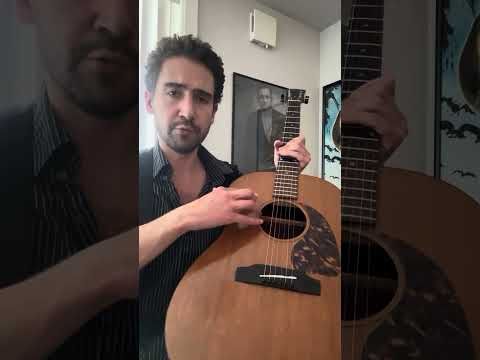 The broken and unplayable 1965 Gibson acoustic guitar that was used to record “Sunshine”