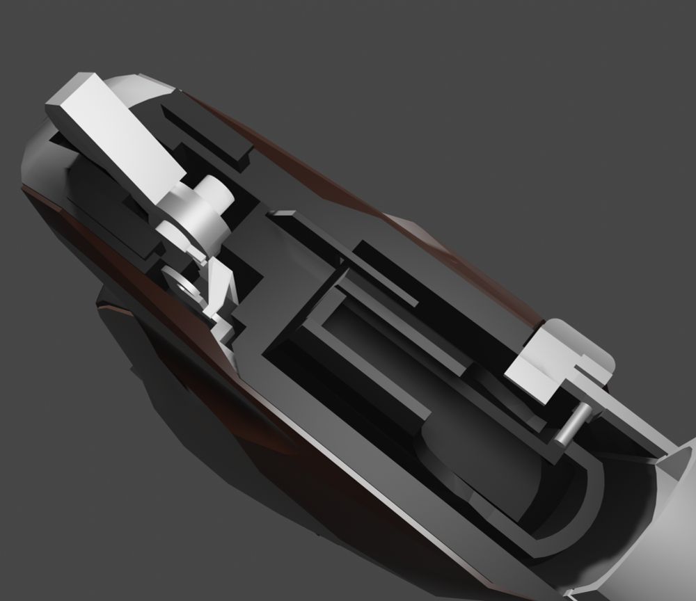 Top view of the frame with the slide taken off to view all the inner bits. Namely, the trigger bar, semi-auto sear, and hammer. The ejector juts out just before the magazine well. Off to the right is the slide stop/release, then the barrel in front of that.