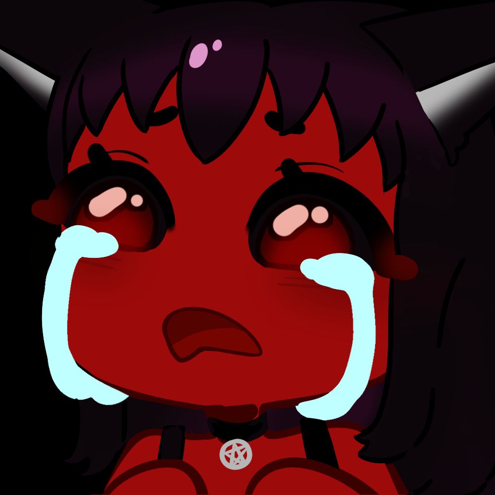 Red skinned demon crying