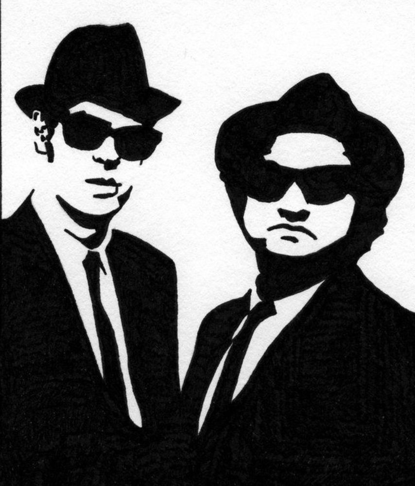 Jake and Elwood Blues wearing porkpie hats, sunglasses, and skinny black ties