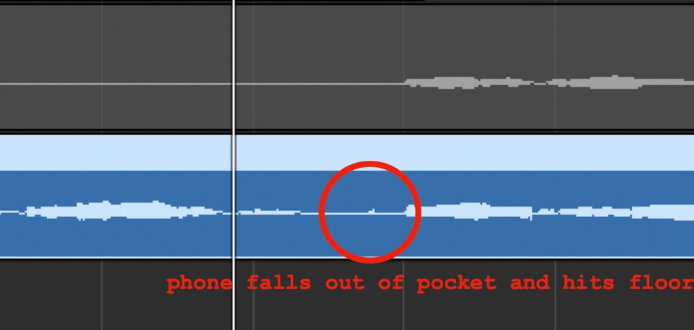 a screenshot of an audio region in a DAW. a noticeable spike in the recording is circled and labelled "phone falls out of pocket and hits floor"