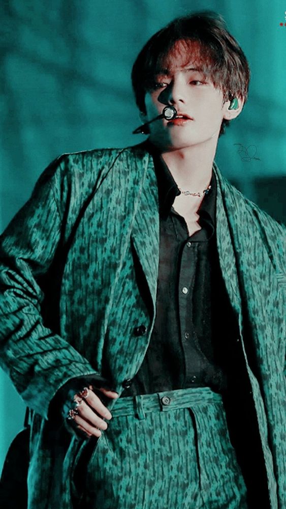 Taehyung in his green suit for the performance of "Singularity" during the LY Tour
