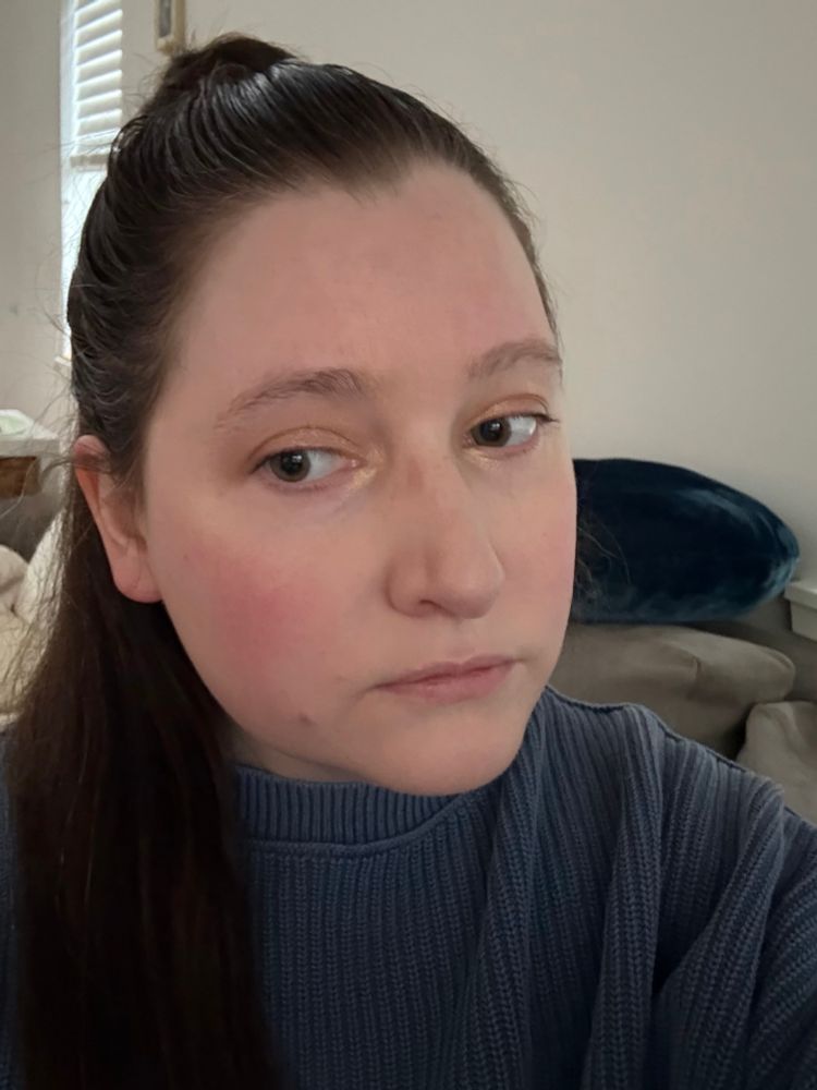 selfie of me, a 37 year old white woman with brown hair and green eyes and a little bit of makeup on