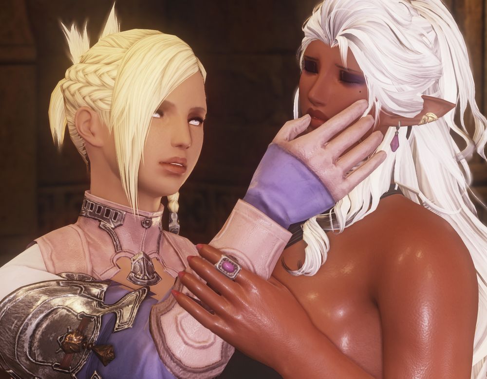 Gisèle's eyes are shut; Minfilia gazes up at her, gently caressing her cheek, her thumb brushing her lip.