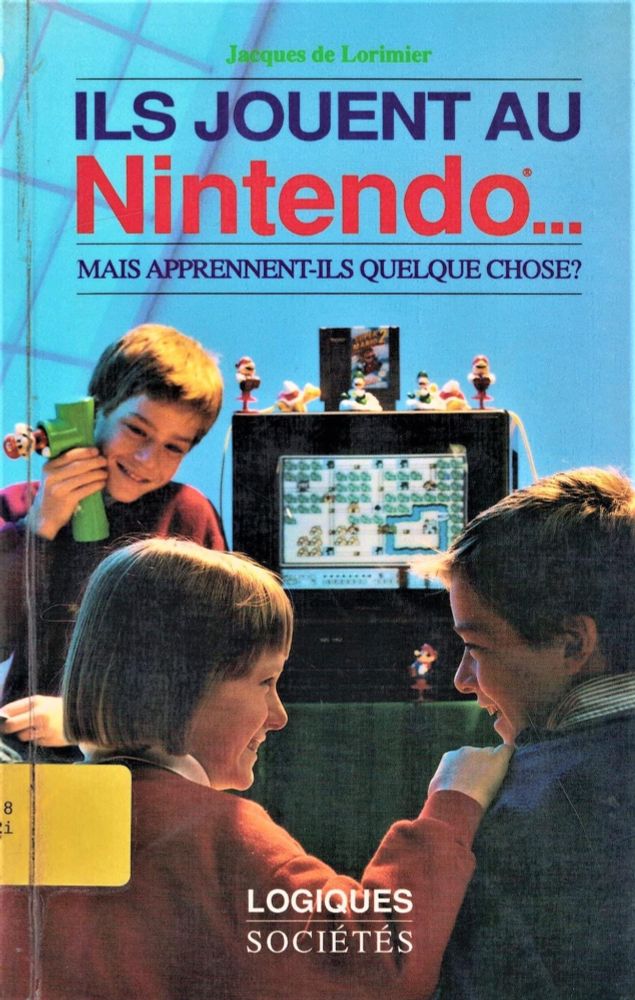 Couverture de l'ouvrage de Jacques de Lorimier aux éditions "Logiques / Sociétés"
Titre : Ils jouent au Nintendo. Mais apprennent-ils quelque chose ? 

Photographie : deux enfants nous tournent le dos mais leur visage est visible de profil. ils se regardent et sourient/rient. Face à eux : un écran d'ordinateur en couleurs avec sur l'écran une partie d'un jeu (possiblement le premier Zelda sur la NES). A coté de l'écran, toujours en face, un troisième enfant leur sourit d'un air pensif. Il tient contre sa joue une sorte de tube vert d'où sort un playmobil