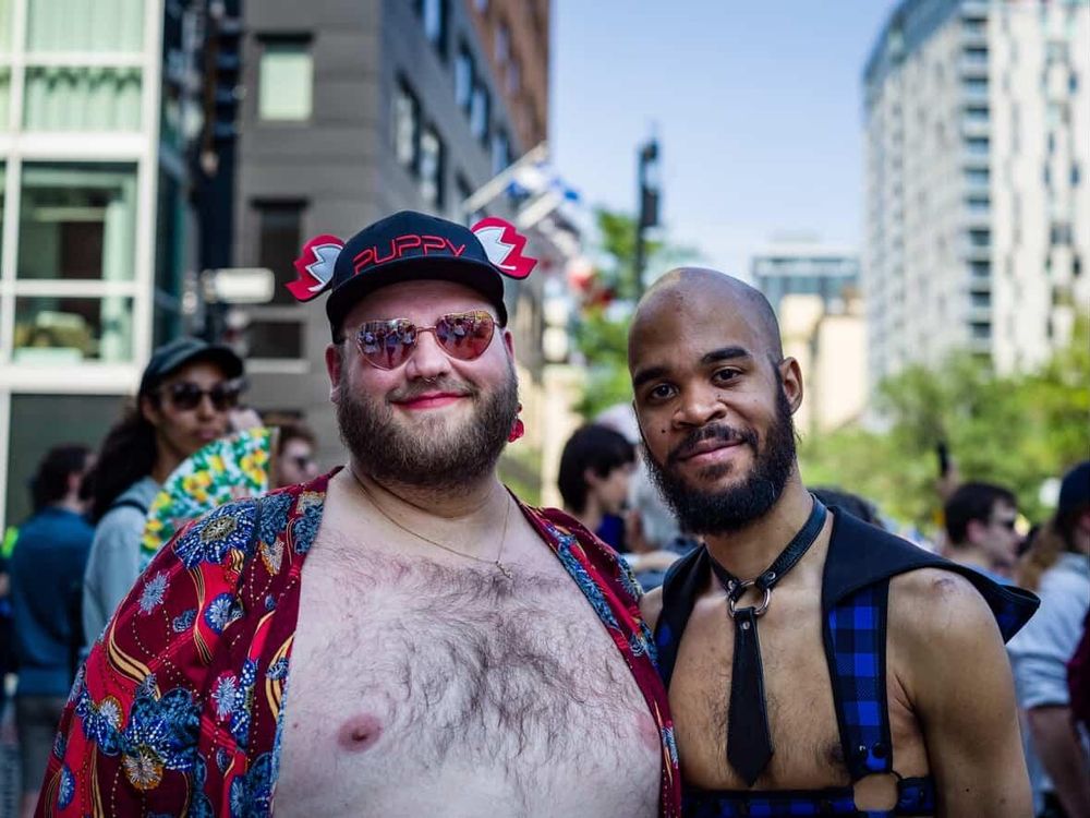 marc and i posingnfor a photographer during the pride parade