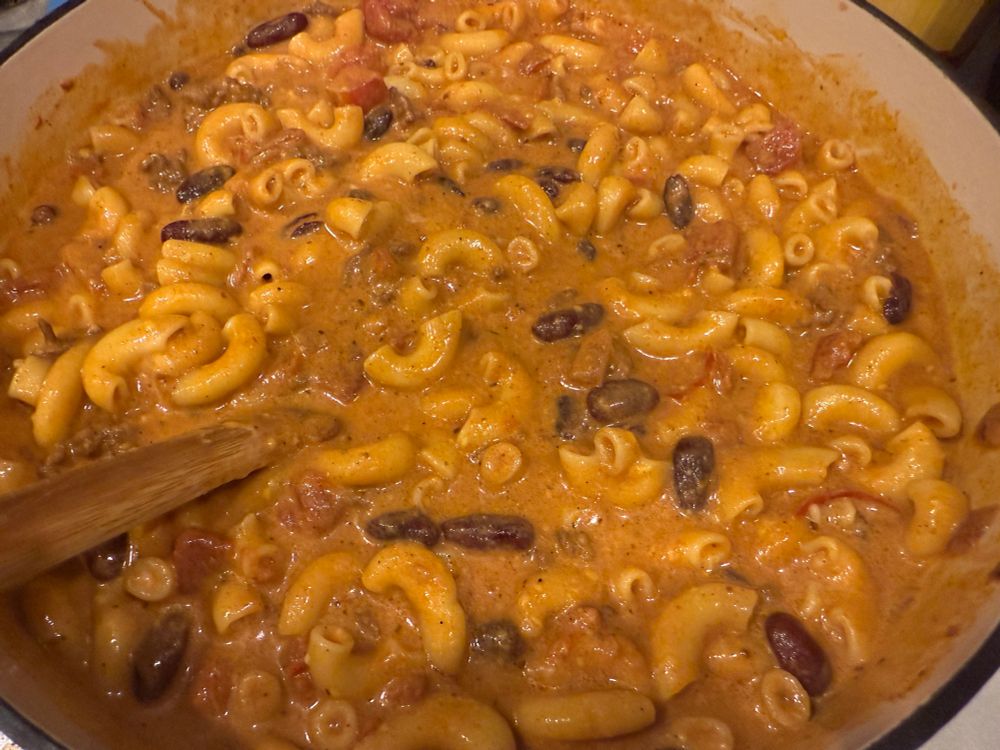 A Dutch oven full of chili mac 