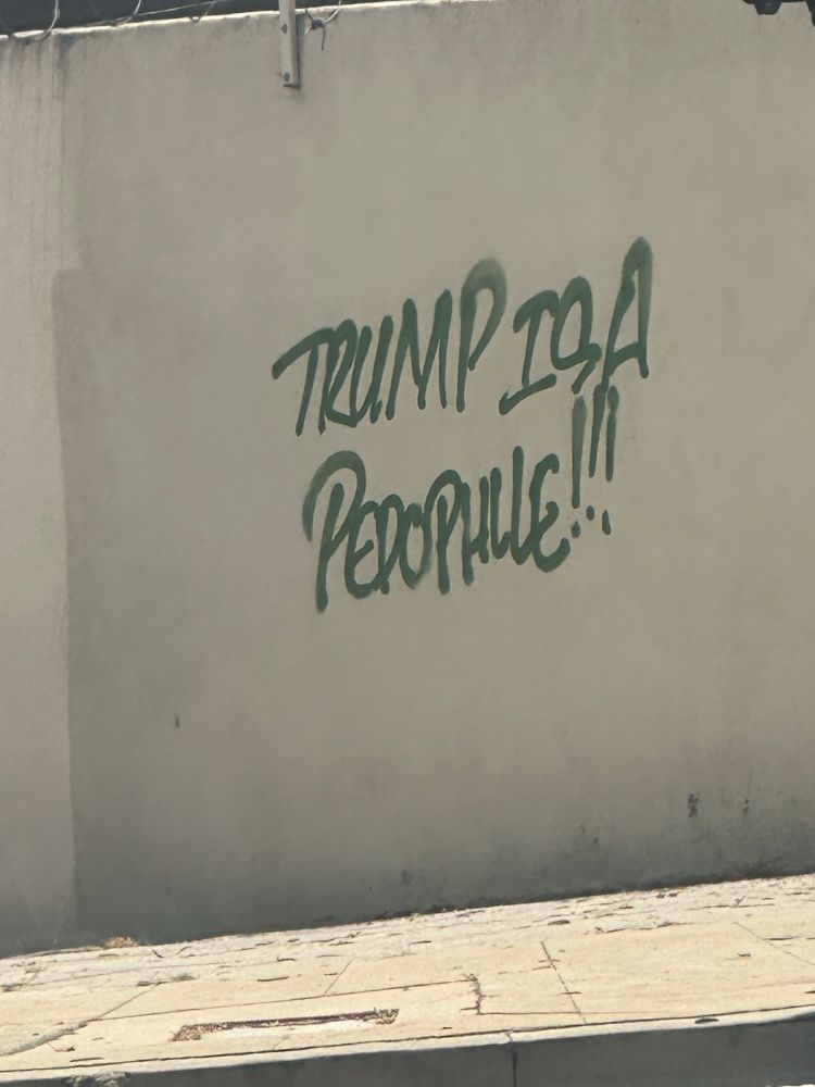 Picture of graffiti in Downtown Los Angeles that reads “Trump is a pedophile!!!”