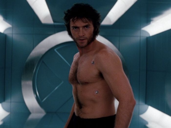 Hugh Jackman in the first X-Men movie shirtless. He is fit and muscled but not freakishly sculpted like an action figure. 