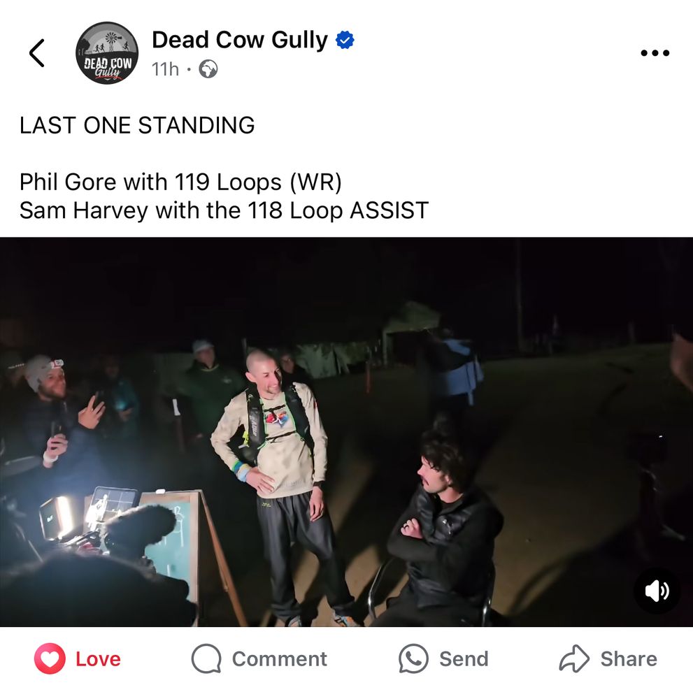 Screenshot from Dead Cow Gully Backyard Ultra Facebook page. 2 runners chat in the dark with a few spectators around them. The caption reads:

LAST ONE STANDING
Phil Gore with 119 Loops (WR)
Sam Harvey with the 118 Loop ASSIST