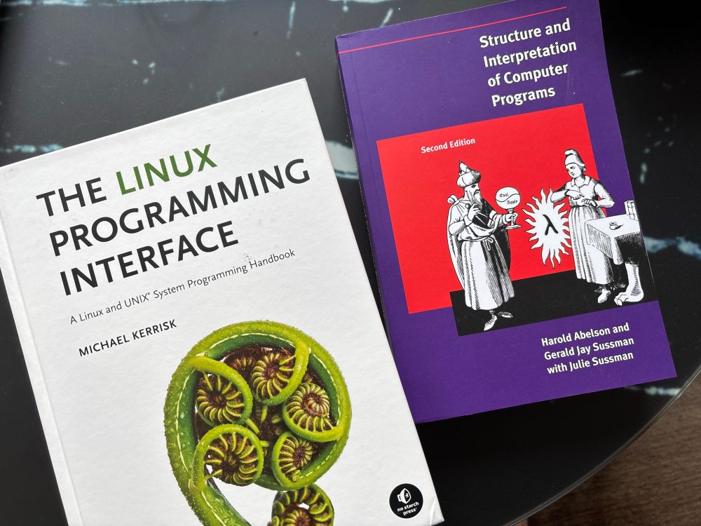 The Linux Programming Interface by Michael Kerrisk and Structure and Interpretation of Computer Programs by Harold Abelson, Gerald Jay Sussman with Julie Sussman