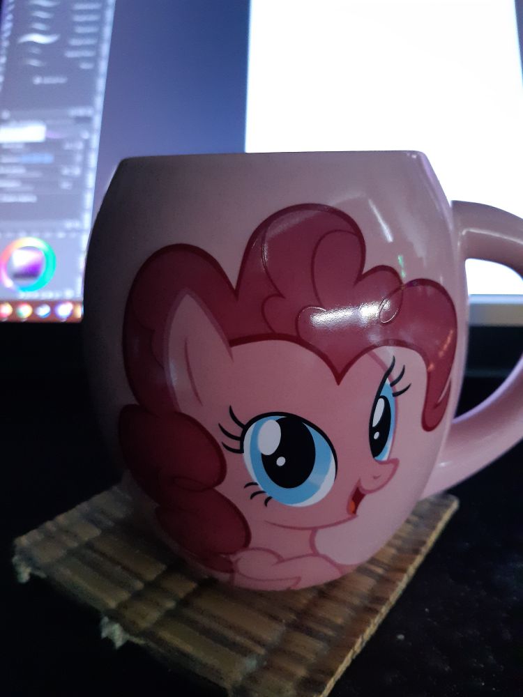 Large mug with Pinkie Pie on the front. Sneaky clip studio in the background 