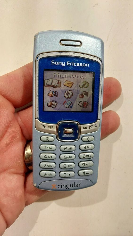 2003 Sony Erickson cell phone with cute icons on the screen