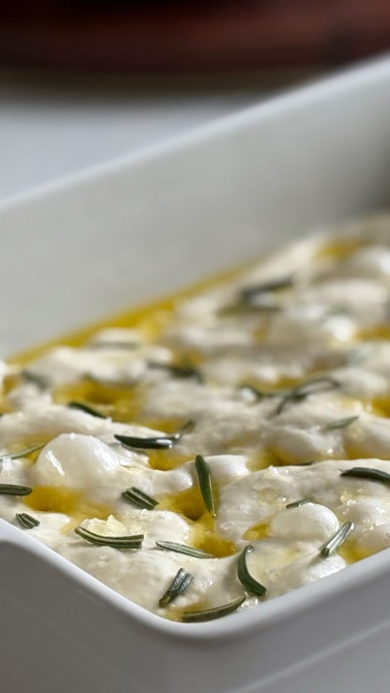 A close-up photo of focaccia dough.