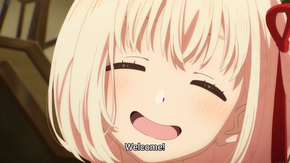 Welcome!
Nishikigi Chisato from the anime short series Lycoris Recoil: Friends are thieves of time. She's smiling wide at the camera with both eyes closed.