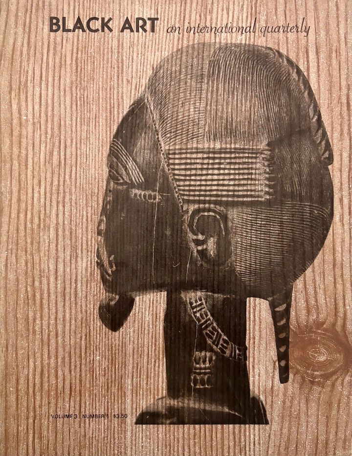 A quarterly journal 'Black Art: An International Quarterly', volume 3, number 1 from January 1979. Cover illustration shows an African sculpture of a man's head, seen in profile, superimposed on a wood grain background. All in shades of brown.