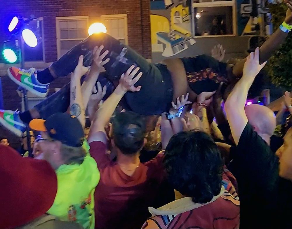 Maya Marie crowd surfing at the start of Monsterwatch's set