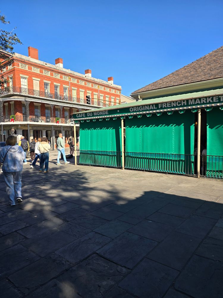 A corner photo of Cafe Du Monde. 