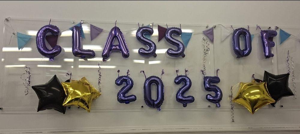 Image shows balloons reading 'class of 2025'