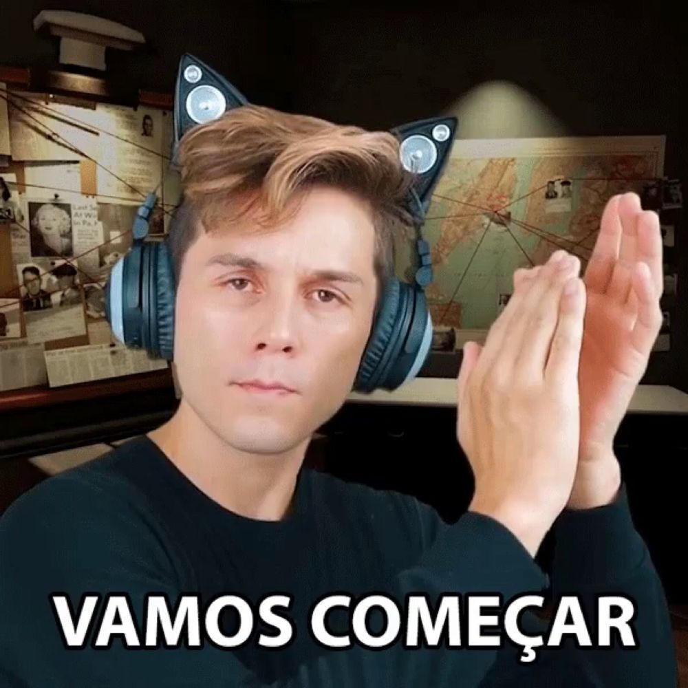 a man wearing headphones with cat ears and the words vamos comecar