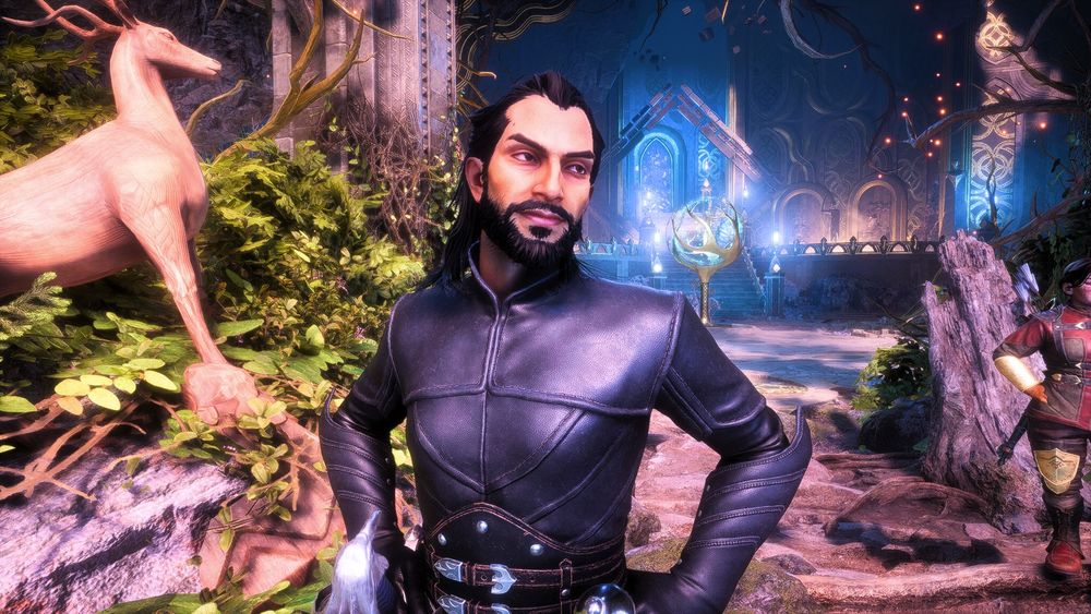 Lucanis Dellamorte standing in the Crossroads.  He has his hands on his hips and is looking off to his left with a gentle smile.
