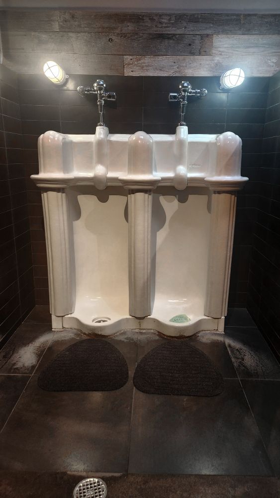 Twin old fashioned urinals 