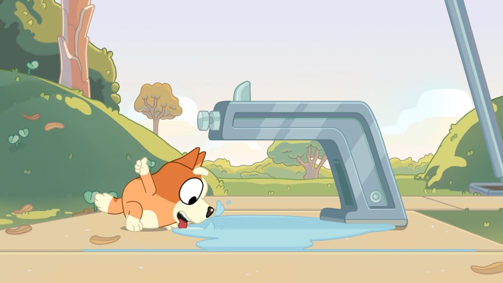 From the Bluey episode ’Bike’, in which our heroes are going through the frustrations of learning how to do things. Here, Bingo has worked out that the best way to drink from the bubbler is to ‘flood the zone’ and just lap the water up from the ground. ‘Whatever works’ is a good life lesson!