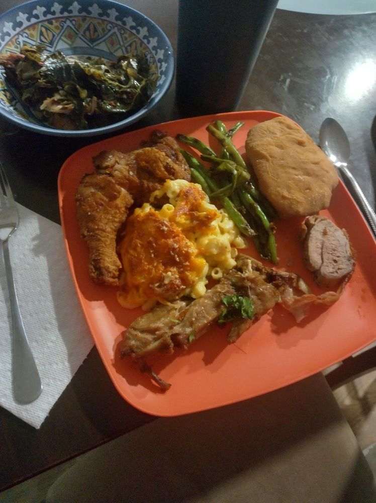 Turkey, chicken, bacon-wrapped pork chops, fried bread, green beans, greens, and not pictured, corn bread dressing.