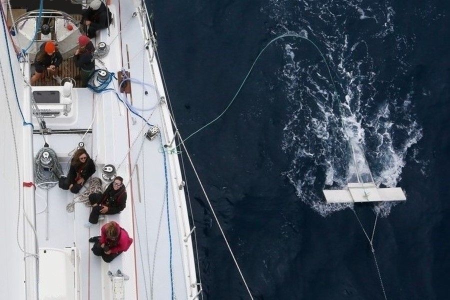 Sailboat pulling manta trawl