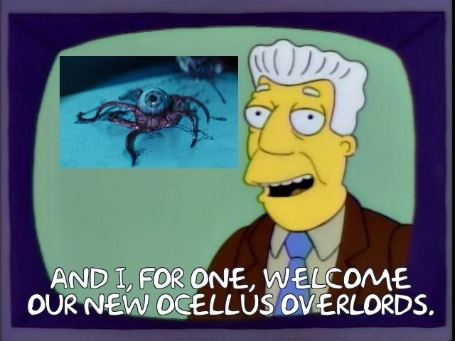 Simpsons Screenshot. Kent Brockman on camera with the octopus eyeball from Alien: Earth. Text reads, "and I for one, welcome our new ocellus overlords"