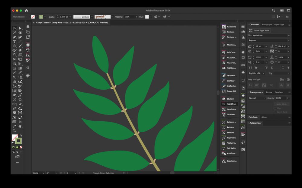 a screenshot of adobe illustrator and its various tools, with a green walnut tree branch on the screen in close detail.