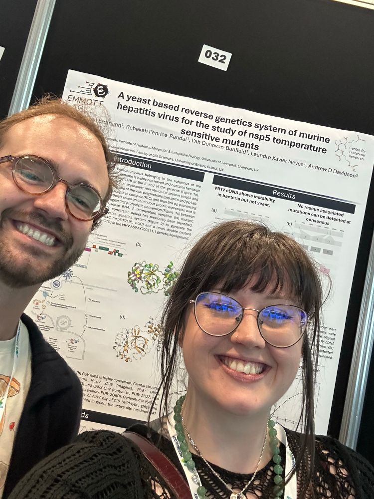 Rebee and Max selfie in front of microsoc poster