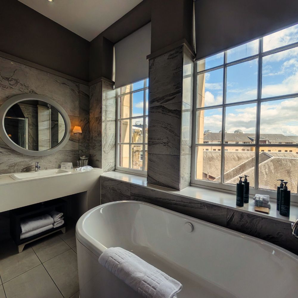 Bathroom big enough to dance in, with both shower and bathtub. And more lovely views of Edinburgh.