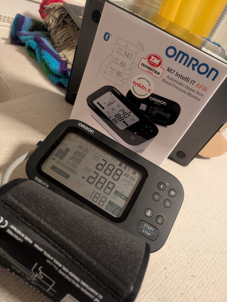 The Omron M7 Intelli IT AFib automatic upper arm blood pressure monitor, with screens for possible Atrial fibrillation during blood pressure measurement.