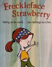 Cover of banned book 'Freckleface Strawberry' depicting a red-headed girl. 