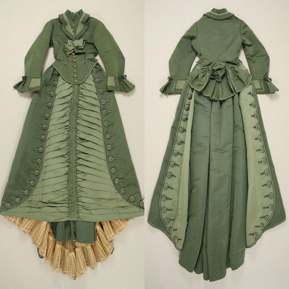 Front and back view of a shaded green dress with pleating and decorative buttons 