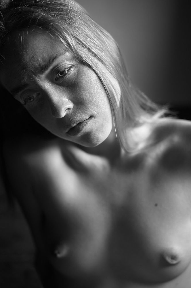 Melancholy, a monochrome portrait of a young blonde woman 