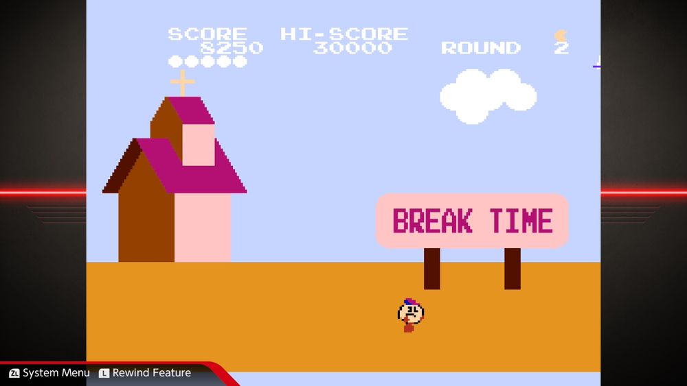 Pac-Man in front of a church and a sign that says "BREAK TIME"