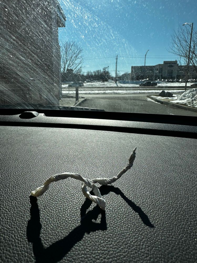 Paper worm on the dashboard