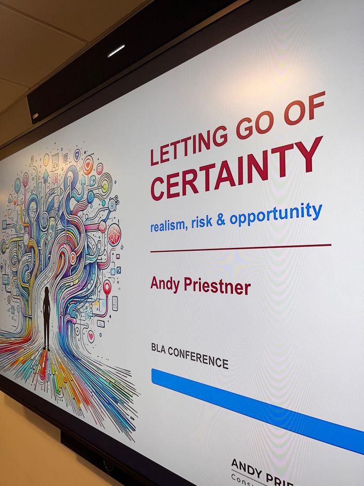 PPT slide with text reading ‘Letting go of certainty’ and ‘Andy Priestner’ 
