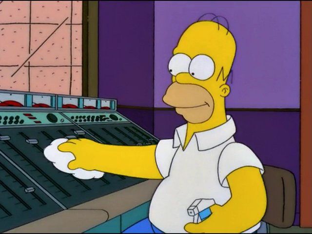 Screenshot of Homer cleaning a mixing console at a studio