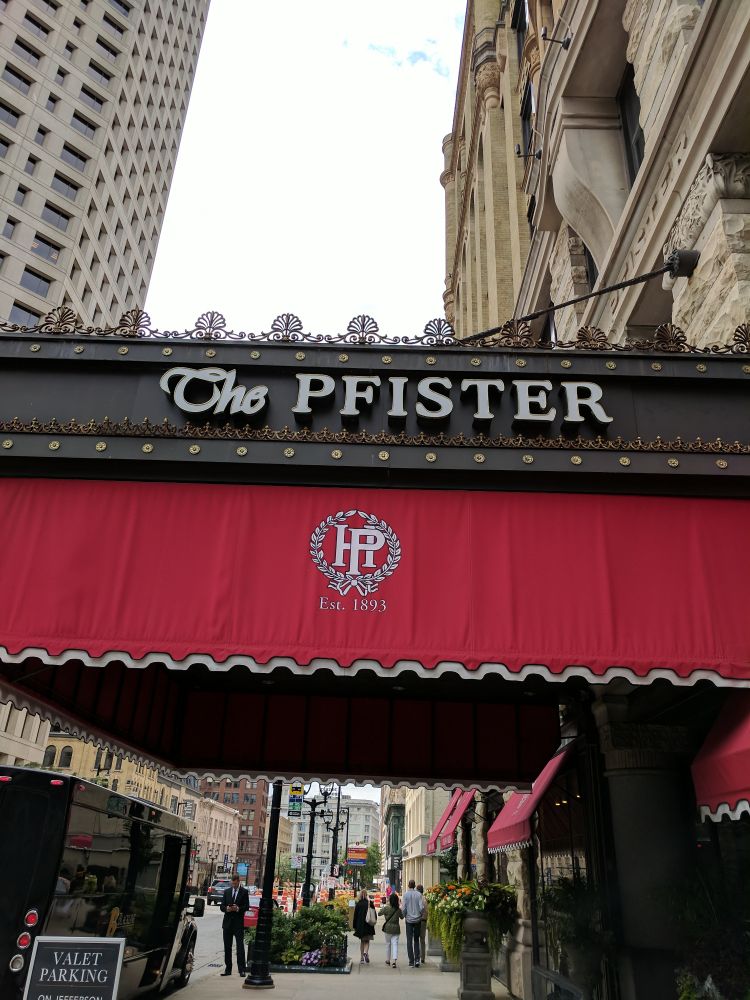 A fancy sign that reads "The Pfister"